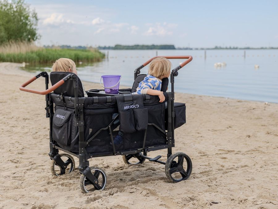 Mr Fold stroller wagon with children on the beach