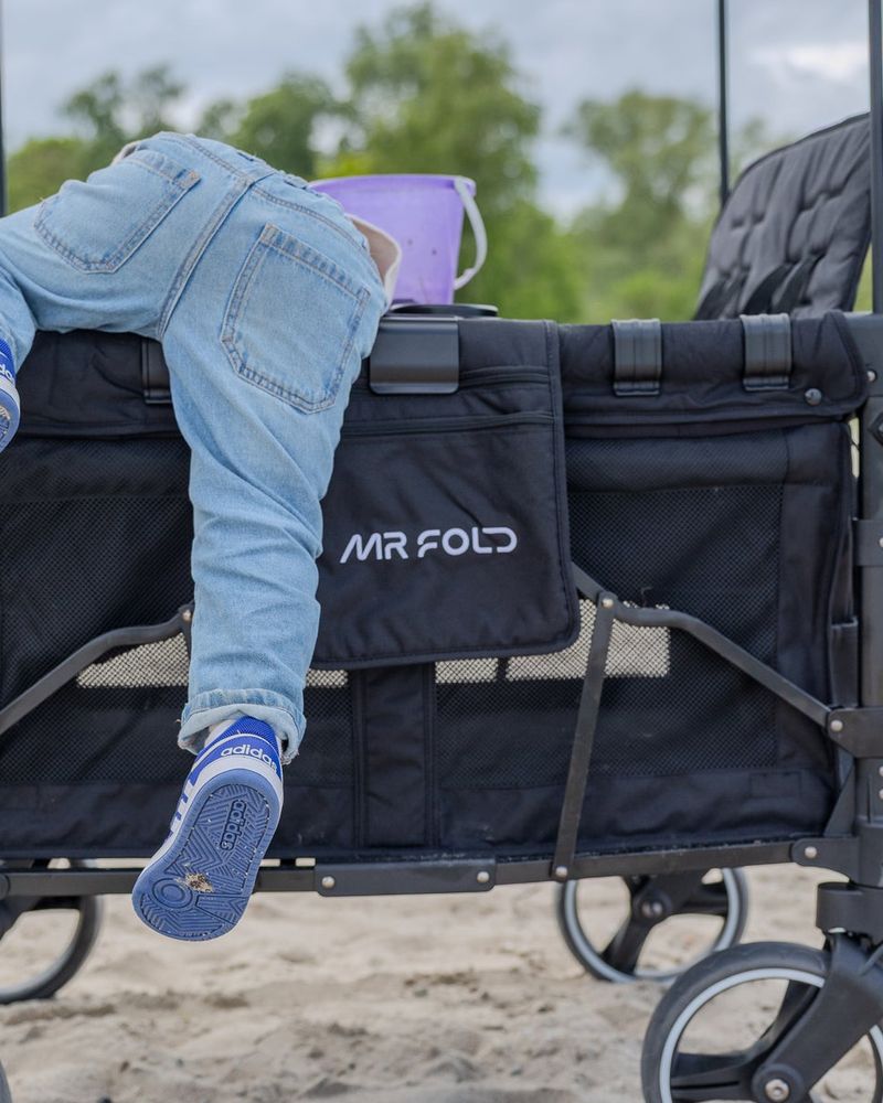 Child climbing in through the front of the Mr Fold